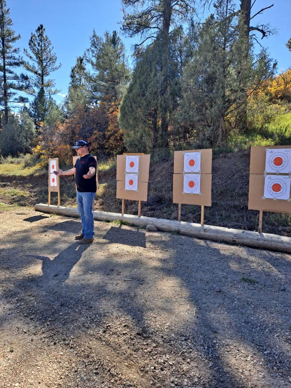 Jake setting up bullseye targets before a class
